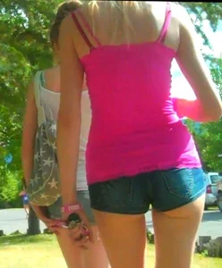 Skinny babe in denim shorts with a nice gap showing ass cheeks