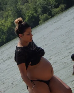 Two thick pregnant girls in bikinis