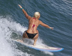Candid surfer babes on the beach and in bikinis