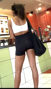 hot petite Indian chick showing some T&A in skimpy workout clothes