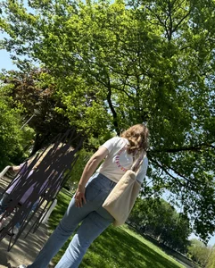Hot milf's ass in tight blue jeans, creepshot at the park