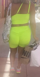 Latina in spandex shorts + other girls