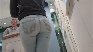Cute Ass in Blue Tight Jeans at the Store Closeup