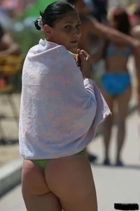 Beach voyeur girls in bikinis, thongs and topless