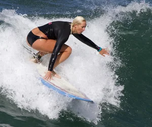 Candid surfer babes on the beach and in bikinis