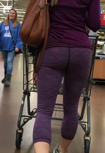 Sexy blonde shopping at Walmart in purple leggings with some vpl