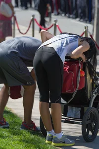 Brunette milf with sexy body in spandex leggings