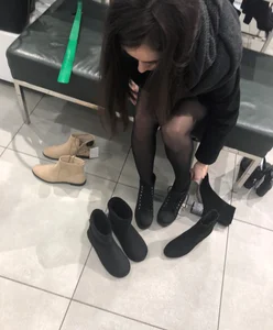 Candid teen wearing black pantyhose changing shoes creepshots