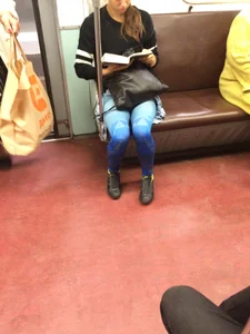 Girl in Blue Spandex Tights Reading in the Subway Train Candid