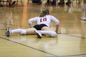Female Volleyball Player in Spandex Shorts and Knee Socks