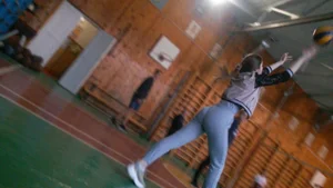 Girl Playing Volleyball in Gymnasium Candid Photos