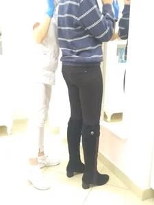 Nice ass in tight pants and knee high boots creepshots