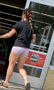 in purple Lycra shorts…