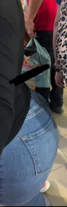 Huge booty in tight jeans closeup