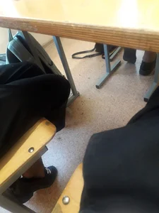 College candid teens' flats under desk, dangle creepshots