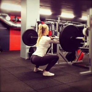 Sexy Blonde With Skinny Fit Legs Working Out in Gym