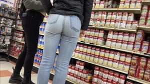 Sexy Asian girl grocery shopping in tight jeans with a nice ass