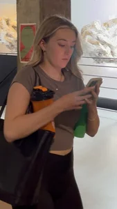 Blonde College Girl In Leggings Girl Keeps Touching Her Booty