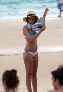 Cute beach girl with decent body in bikini