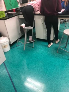 College teen wearing tight in class