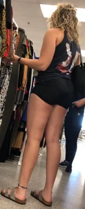 Tall thicc curly blonde in tight black shorts 0927