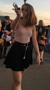 Braless beauty in tank top and skirt with puffy nipples