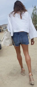 Flat ass leggy girl in denim shorts