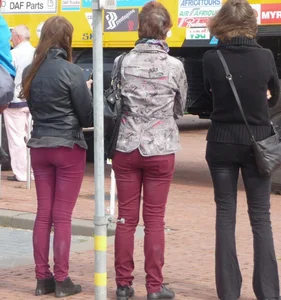 Two skinny butts in tight pants street creepshot