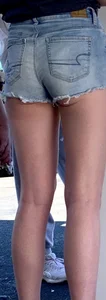 Skinny blonde long legs and denim shorts w/ cheeks