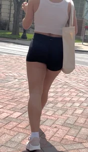 Curly Campus Brunette with amazing Bubble Butt in Tight Shorts (oc)