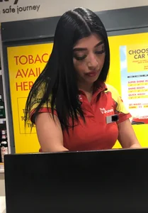 Convenience store employee with a sexy big ass in leggings
