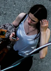 Hot chick in a blouse street photo from above - her bra is seen