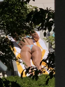 (OC) Blonde girl tanning poolside
