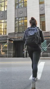 Black spandex and little grey boots crossing the street - such a cutie