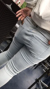 Fat ass in light jeans