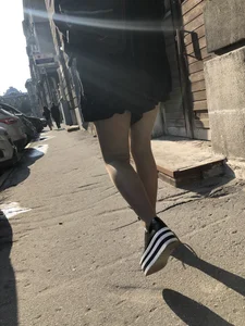 Nice candid girl's slim legs closeups