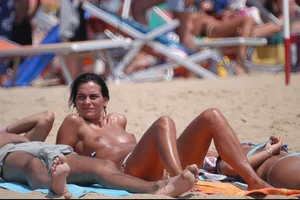 Girls on a nude beach in Bibione, Italy