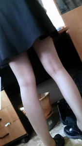 Thin Pale Legs of a Teen College Student in a Dress - Closeup Candid Photos in Classroom