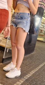 Adorable cute candid teen wearing a top and fringe jean shorts street creepshots, nice tummy and legs