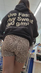 Thick brunette in short leggings and company