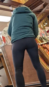 Tight legs and ass in black legging. Bend over