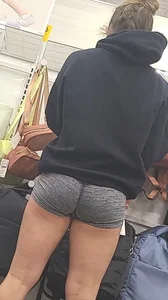 Got in line right behind these sexy ass cheeks and tan legs in short SKIN-TIGHT shorts. W