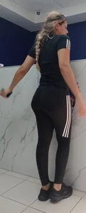 Beautiful blonde girl with amazing big ass in black adidas leggings, with a small camel toe [OC]