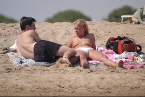 Girls on a nude beach in Bibione, Italy