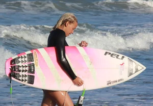Hot surfer chicks out in the water