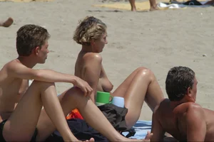 Girls on a nude beach in Sitges, Spain