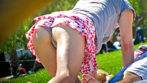 Girl upskirted at the park in little heart patterned skirt