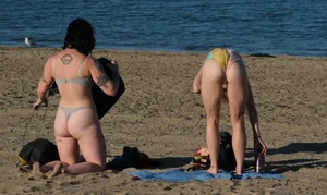 Ladies literally making out on beach