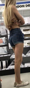 Skinny cheeky beauty in jean shorts