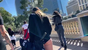Hottie in spandex booty shorts with a nice ass showing her cheeks and slight camel toe